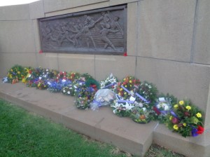 Wreaths at Dubbo War Memorial in the same area where a flag from the Coo-ee March was displayed during the 1925 unveiling of the cenotaph (Photograph: H. Thompson, 25/4/2015)